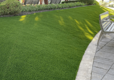 TX Pavers & Turf custom stone paver installation with artificial turf landscaping in Texas, creating stylish, durable, and low‑maintenance outdoor living spaces.